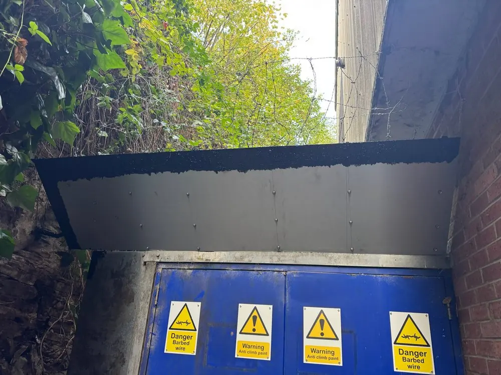 Underside of the fire exit canopy with new sheeting
