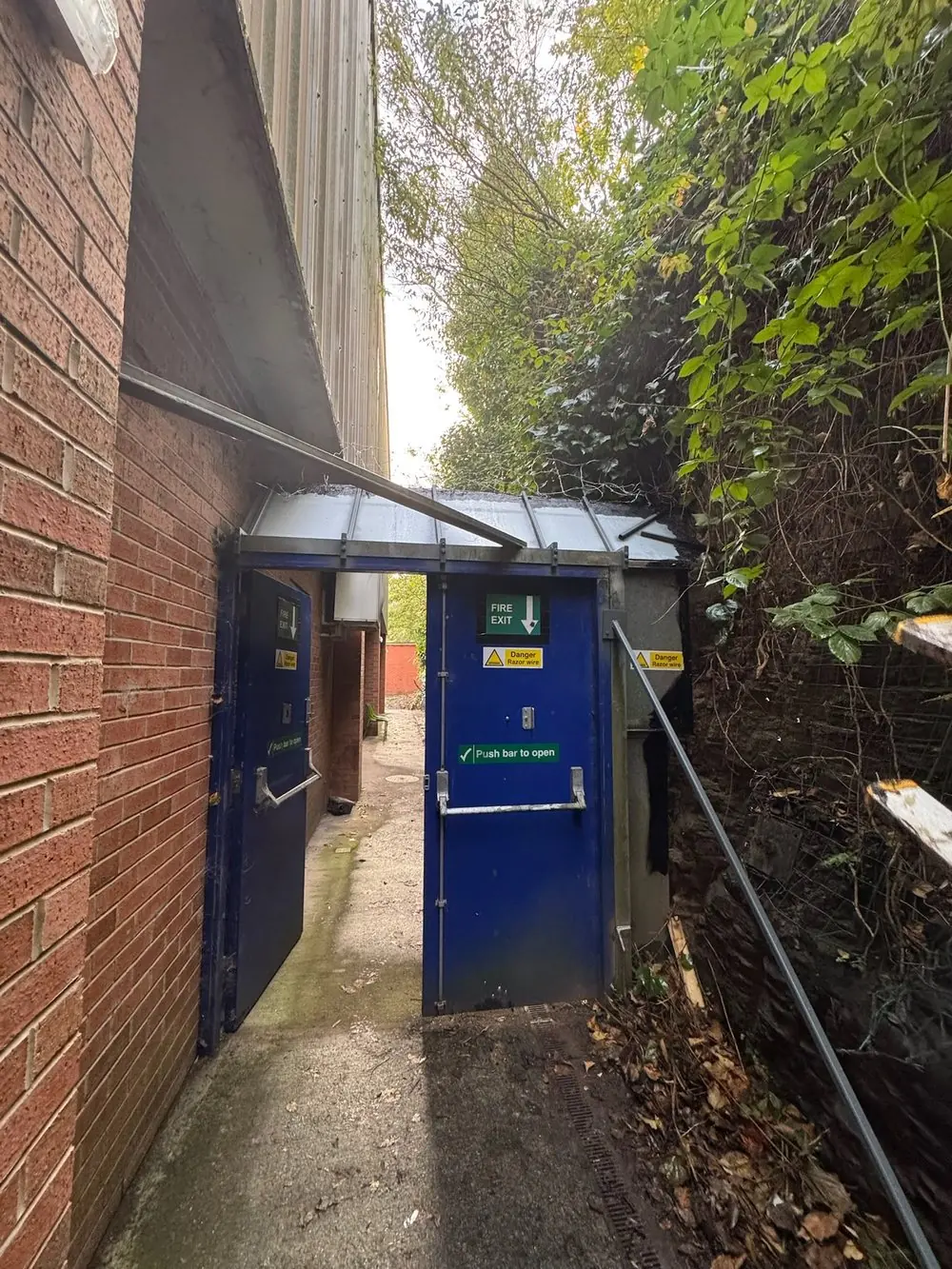 Canopy over a pair of fire exit doors