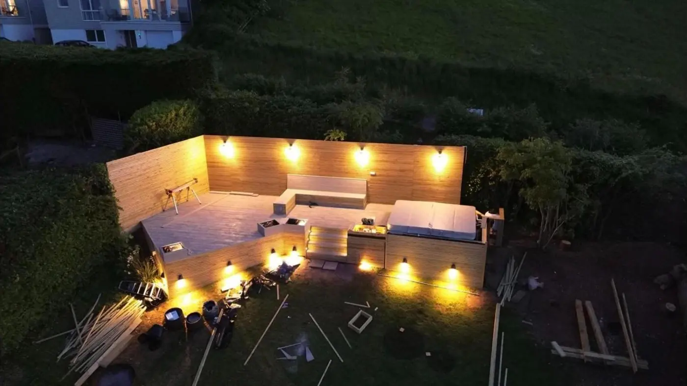Garden decking lit up at night