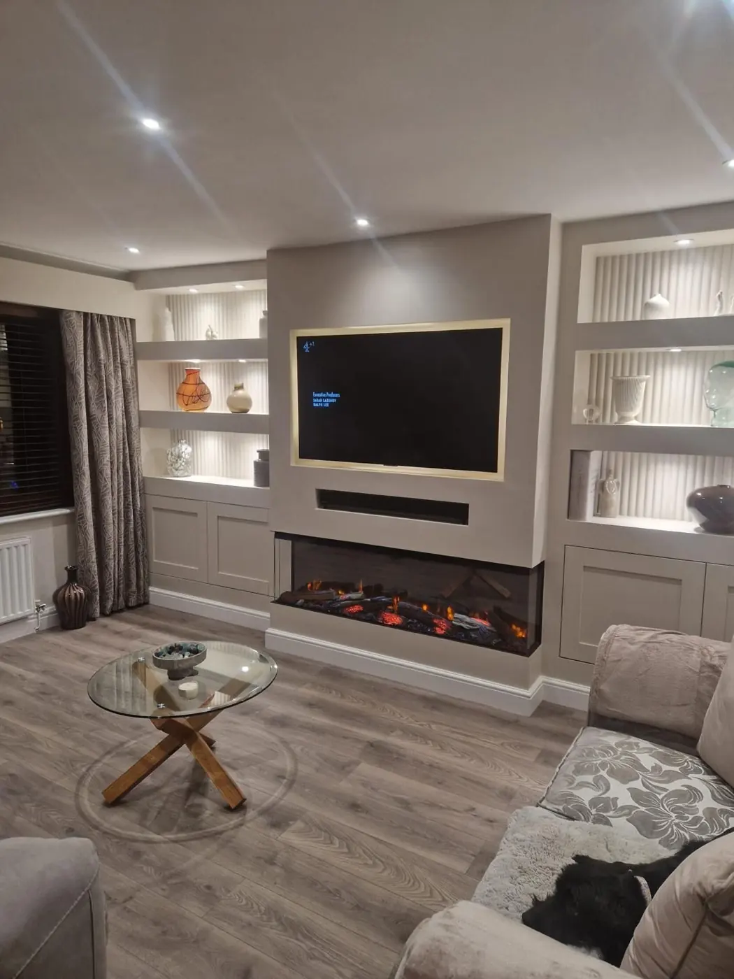 Media wall with fire and alcove shelving