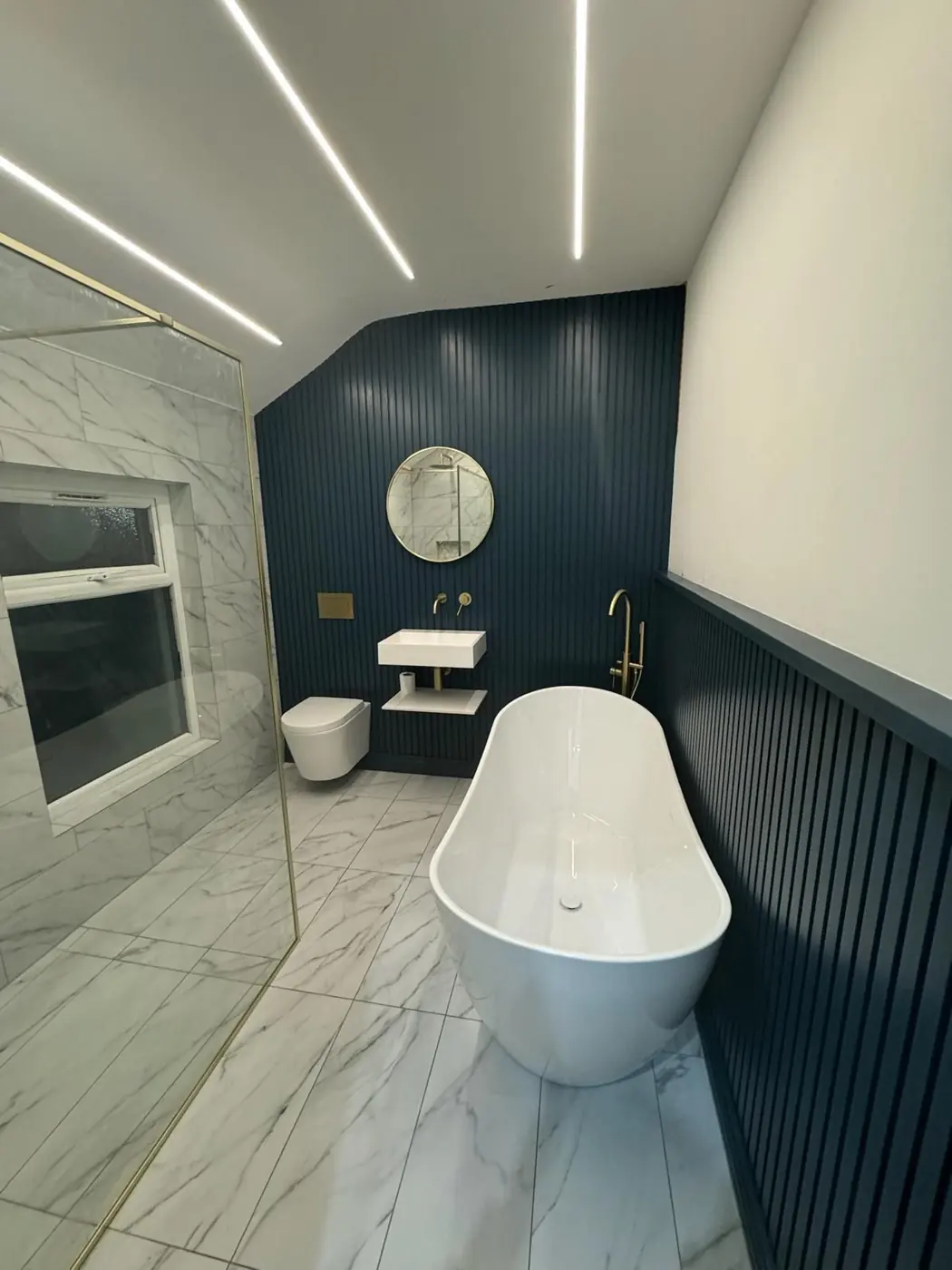 Bathroom with navy slatted wall