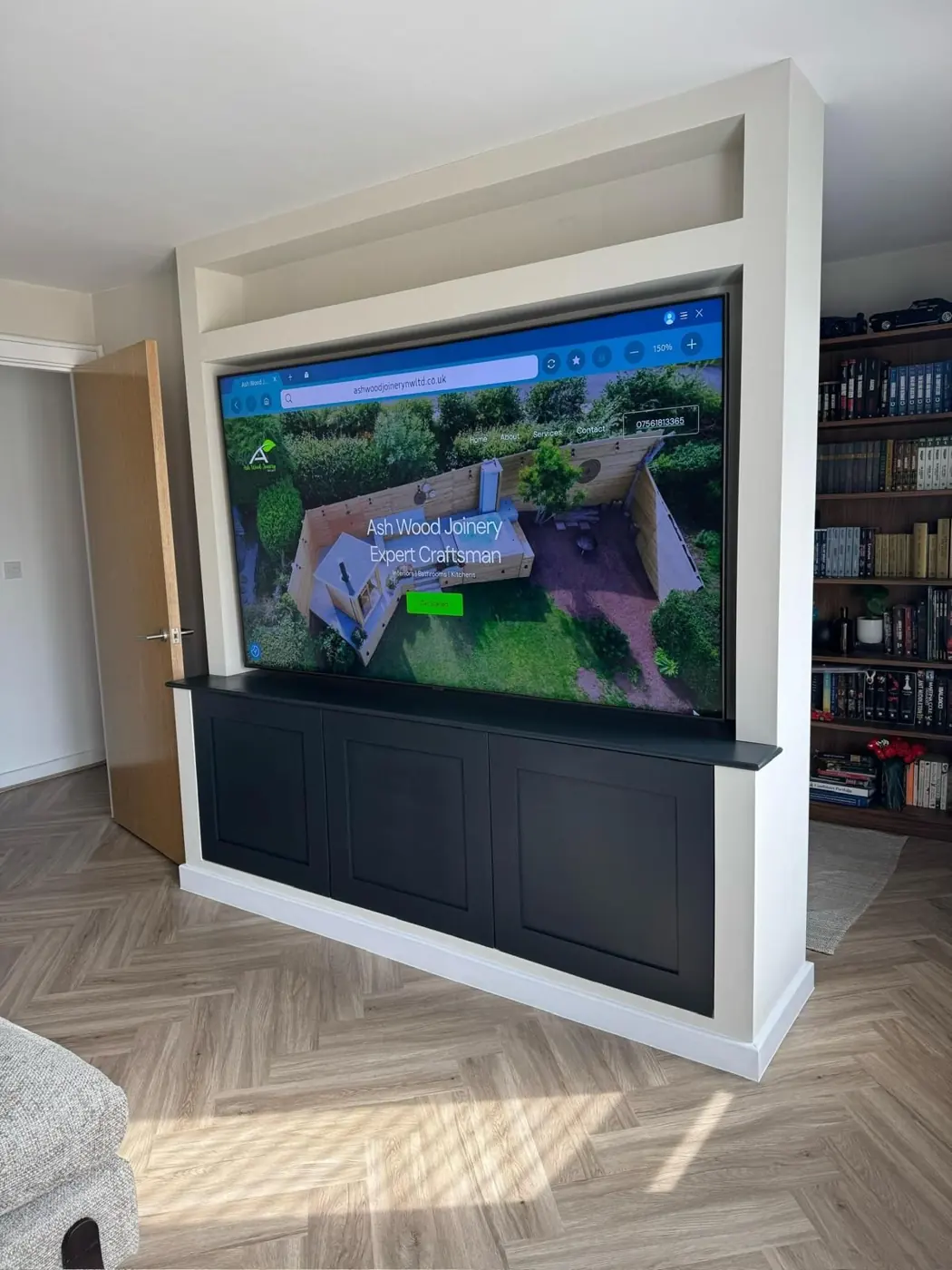 Room divider with built-in TV and cupboards